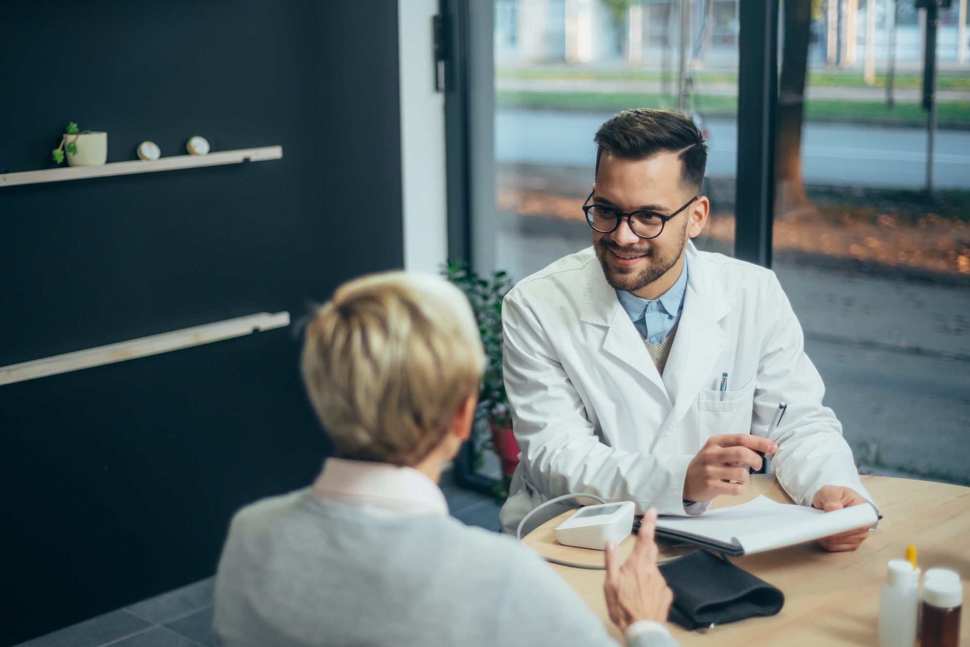 Doctor in consultation with a senior patient