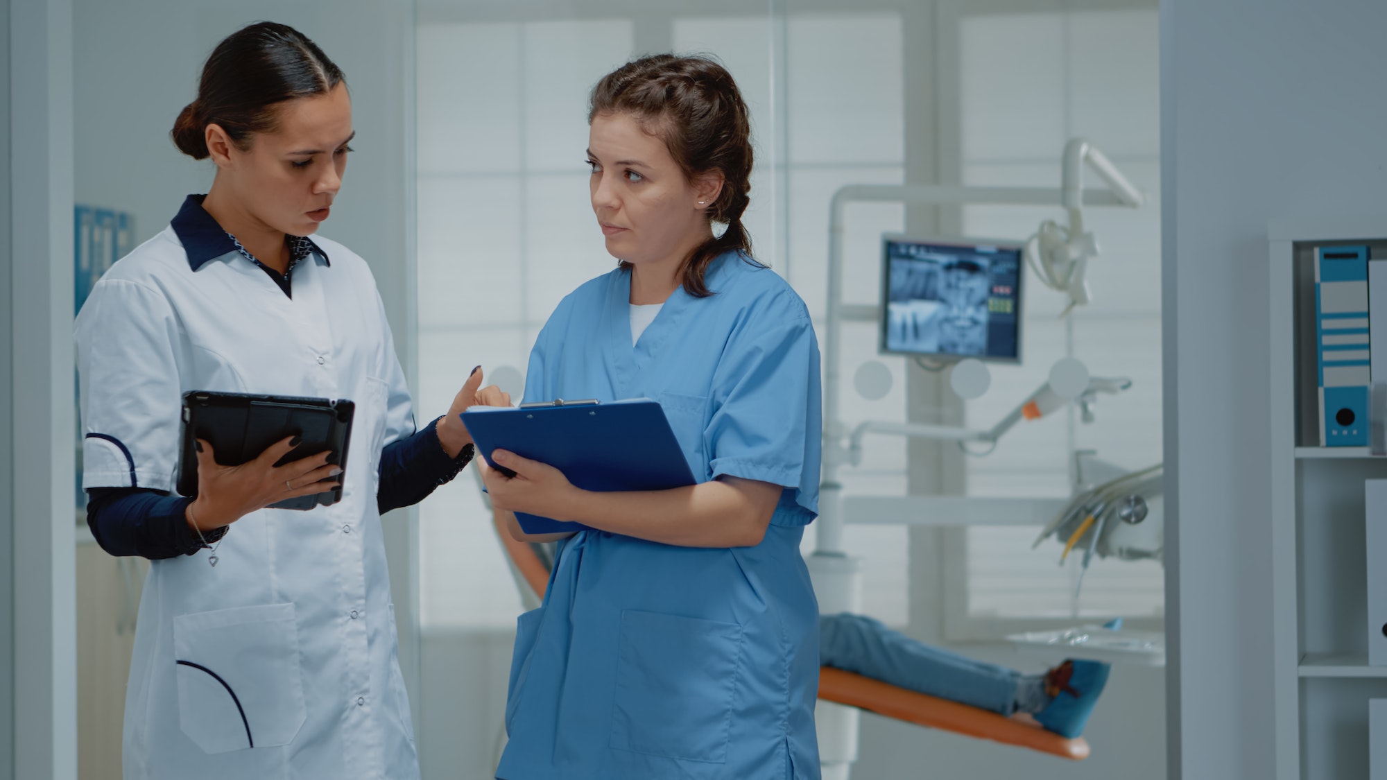 Orthodontists working team discussing dental operation