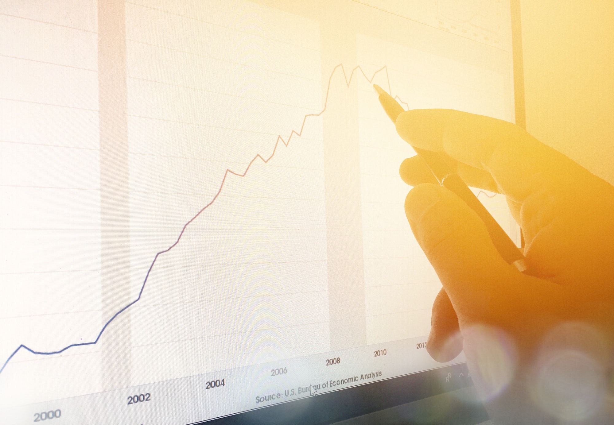 Pen pointing on graph analysis data on screen